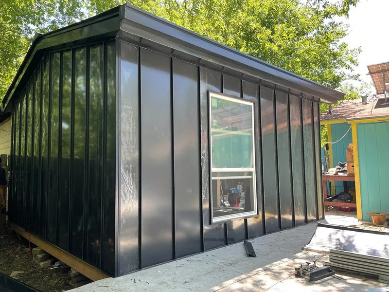 Black standing seam metal wall panels for Roof Inspection in Fort Lee